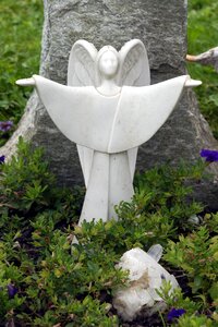 Guardian angel sculpture symbol