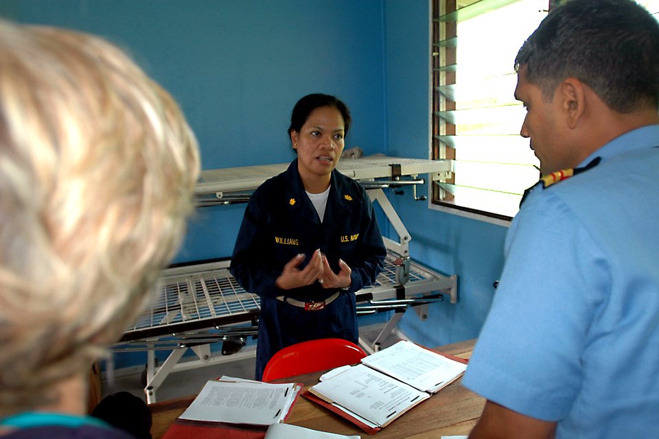 US Navy 070808-N-9421C-022 Lt. Cmdr. Leila Williams attached to Naval Health Clinic Hawaii, briefs her staff on patient movement for medical treatment at Bunabun Health Center, in Madang, Papua New Guinea