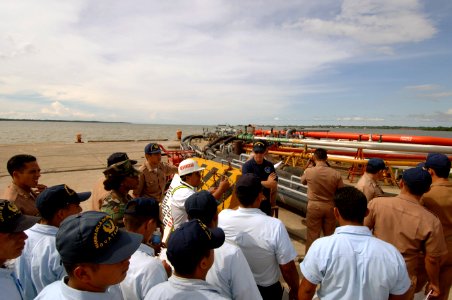 US Navy 070814-N-0989H-073 Master-at-Arms 1st Class Sonia Liverpool and Operations Specialist 2nd Class Tobias Dodgen conduct a port vulnerability assessment walk through in Puerto Santo Thomas