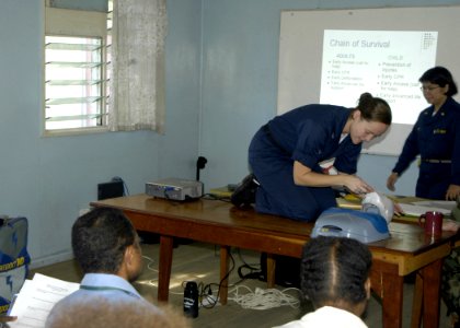 US Navy 070809-N-6410J-033 Aviation Ordnanceman 3rd Class Ashley Cameron demonstrates cardio pulmonary resuscitation (CPR) for a group of nurses at Modilon General Hospital