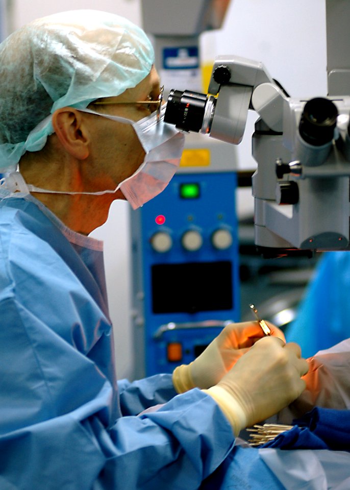 US Navy 070812-N-9421C-033 Capt. Scott McClatchey from Naval Medical Center San Diego removes a cataract from a Papua New Guinea patient aboard the amphibious assault USS Peleliu (LHA 5)