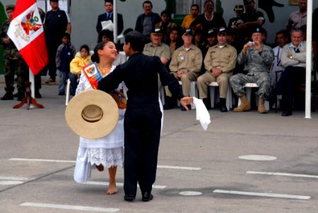 US Navy 070812-N-8704K-269 Lupita Carrion and Alvako Coello perform a dance during a closing ceremony for the Military Sealift Command (MSC) hospital ship USNS Comfort (T-AH 20) photo