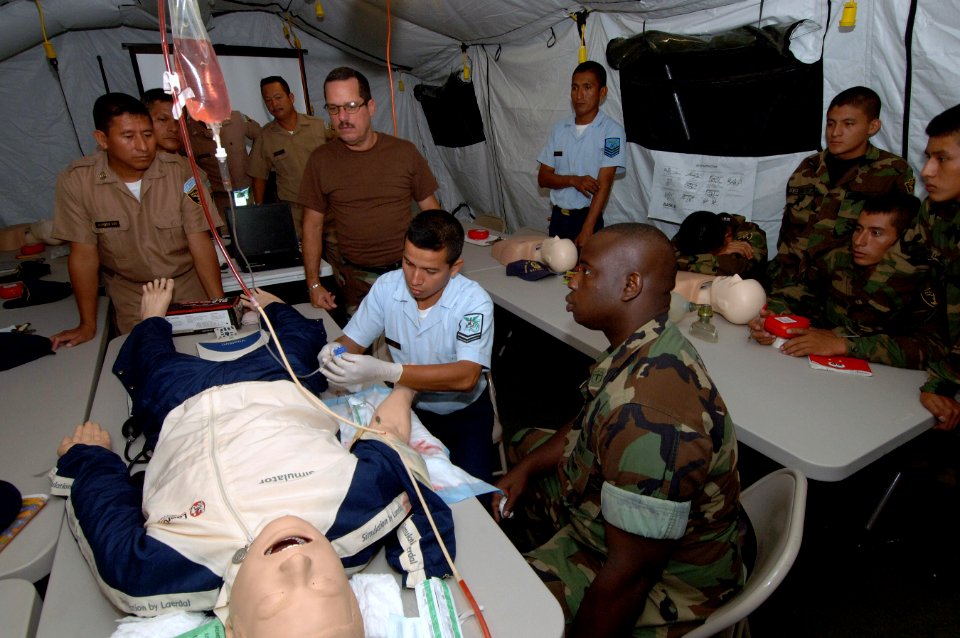 US Navy 070815-N-0989H-027 Sailors attached to Task Group 40.9 provide training to Guatemalan naval officers, sailors and Marines on the proper procedures for inserting an IV into a CPR dummy