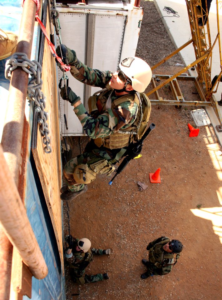 US Navy 070816-N-1328S-003 A Sailor attached to Mobile Security Squadron 3 conducts visit, board, search and seizure training during Seahawk 2007