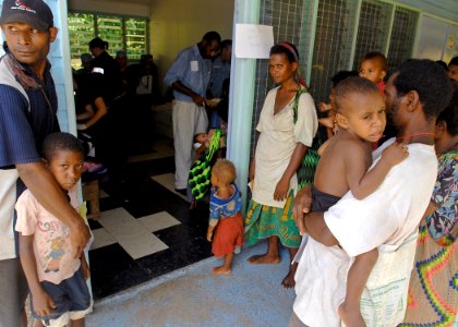 US Navy 070813-N-4954I-094 Villagers wait for medical evaluations at the Ileg Clinic near Madang