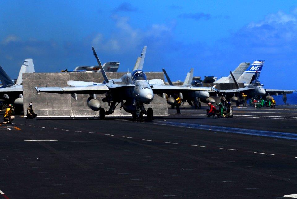 US Navy 070817-N-2659P-082 Flight deck personnel prepare to launch an F-A-18C Hornet, from the