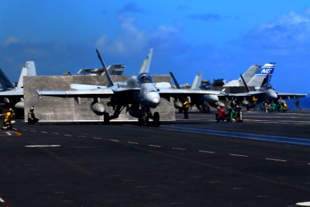 US Navy 070817-N-2659P-082 Flight deck personnel prepare to launch an F-A-18C Hornet, from the