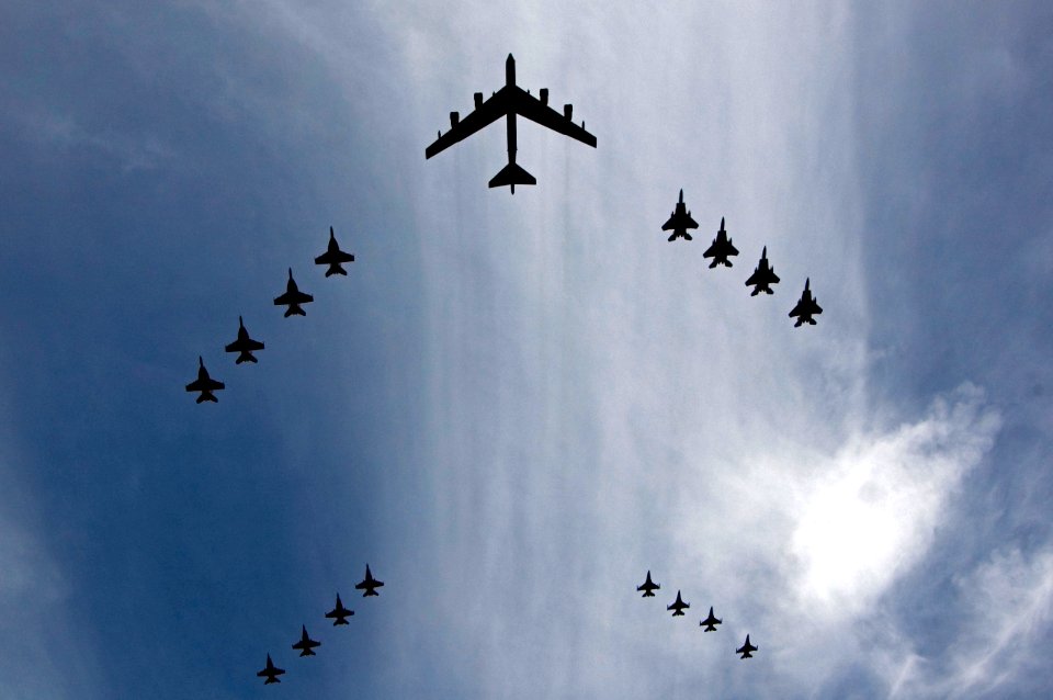 US Navy 070814-N-7883G-035 Aircraft from the Navy, Marine Corps and Air Force including a B-52 bomber conducts a fly by of the John C. Stennis, Kitty Hawk and Nimitz Carrier Strike Groups during a photo exercise (PHOTOEX)