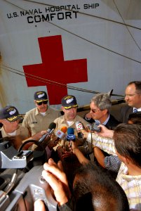 US Navy 070815-N-8704K-134 Capt. Bob Kapcio, mission commander aboard Military Sealift Command (MSC) hospital ship USNS Comfort (T-AH 20), speak to media following an opening ceremony marking Comfort's arrival in Manta, Ecuador photo