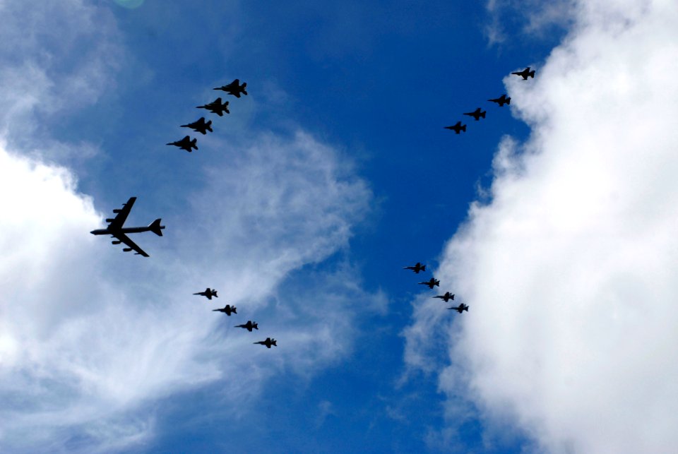US Navy 070814-N-8157C-243 Aircraft from the Navy, Marine Corps and Air Force including a B-52 bomber conducts a fly by of the John C. Stennis, Kitty Hawk and Nimitz Carrier Strike Groups during a photo exercise