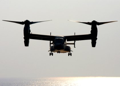 US Navy 070814-N-8154G-125 A U.S. Air Force CV-22 Osprey, assigned to the 8th Special Operations Squadron (8th SOS), approaches amphibious assault ship USS Bataan (LHD 5) during deck landing qualifications (DLQs) photo
