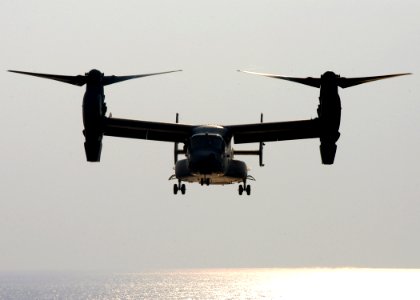 US Navy 070814-N-8154G-125 A U.S. Air Force CV-22 Osprey, assigned to the 8th Special Operations Squadron (8th SOS), approaches amphibious assault ship USS Bataan (LHD 5) during deck landing qualifications (DLQs)