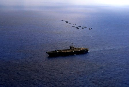 US Navy 070817-N-2659P-330 Aircraft from Carrier Air Wing (CVW) 9 fly over Nimitz-class aircraft carrier USS John C. Stennis (CVN 74) during a practice flight demonstration for an upcoming Tiger Cruise
