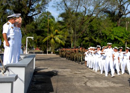US Navy 070817-N-9486C-303 Capt. Douglas Wied, commander of Task Group 40.9, and Cmdr. Charles Rock, commanding officer of High Speed Vessel (HSV) 2 Swift, along with the leadership of Naval Base Del Caribe, render honors durin photo
