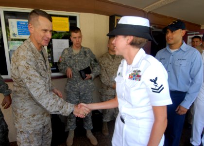 US Navy 070817-N-9758L-082 Chairman of the Joint Chiefs of Staff Marine Corps Gen. Peter Pace shakes the hand of a Sailor assigned to Naval Station Pearl Harbor following an all hands call outside Sharkey Theatre on Naval Stati