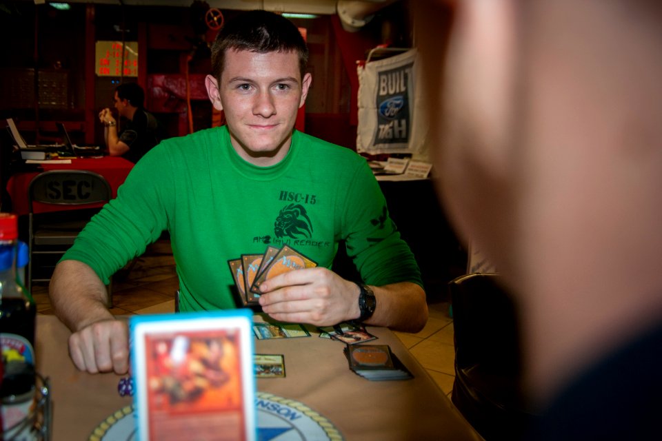 USS Carl Vinson Sailors play Magic, The Gathering 141030-N-NY430-027