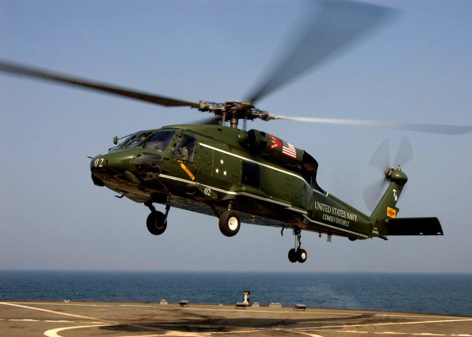 US Navy 070822-N-0483B-002 An SH-60F Seahawk departs amphibious command ship USS Blue Ridge (LCC 19) during flight operations in the Pacific