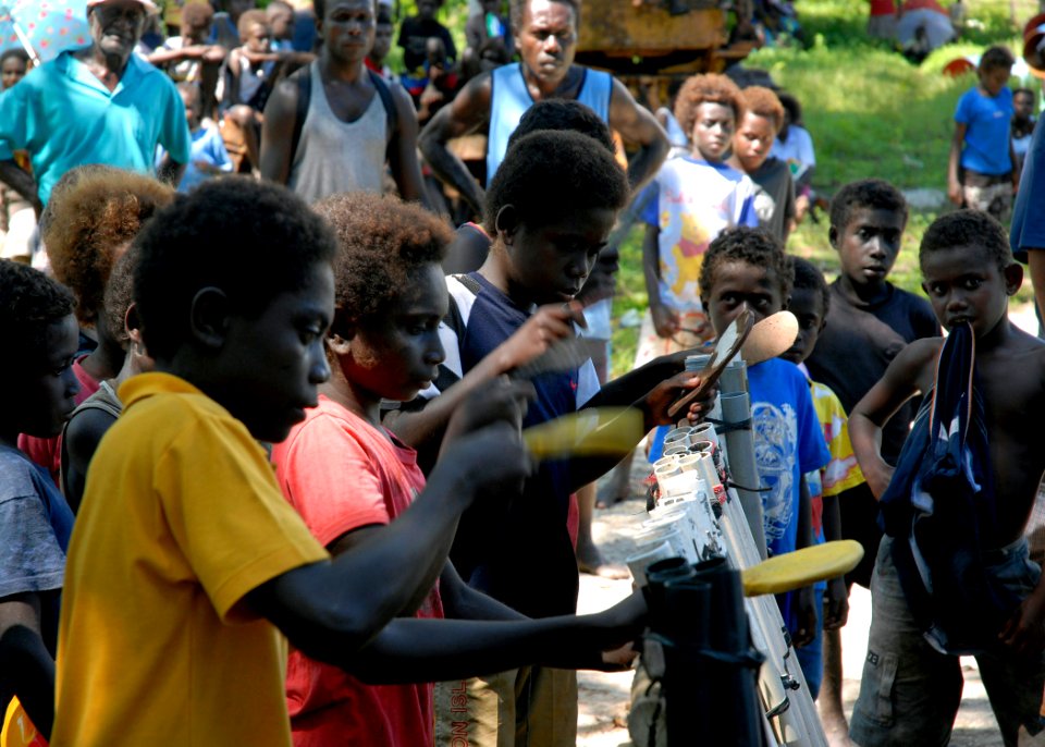 US Navy 070822-N-4267W-065 Children in Sasamunga perform on homemade instruments during the arrival of the Secretary of the Navy (SECNAV) the Honorable Dr. Donald C. Winter