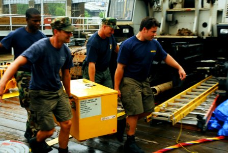 US Navy 070821-N-4515N-257 Navy divers from Mobile Diving and Salvage Unit (MDSU) 2 pack their gear in preparation for their return to Naval Amphibious Base Little Creek, Virginia Beach, Va