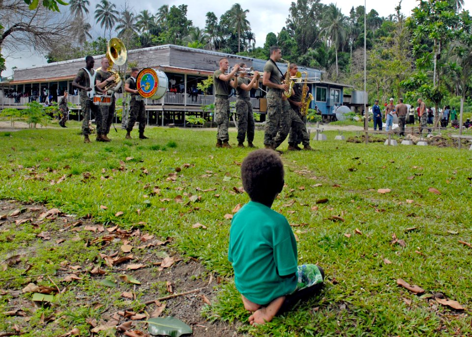 US Navy 070819-N-6410J-061 A small boy watches Marine Forces Pacific Band perform a concert in support of Pacific Partnership
