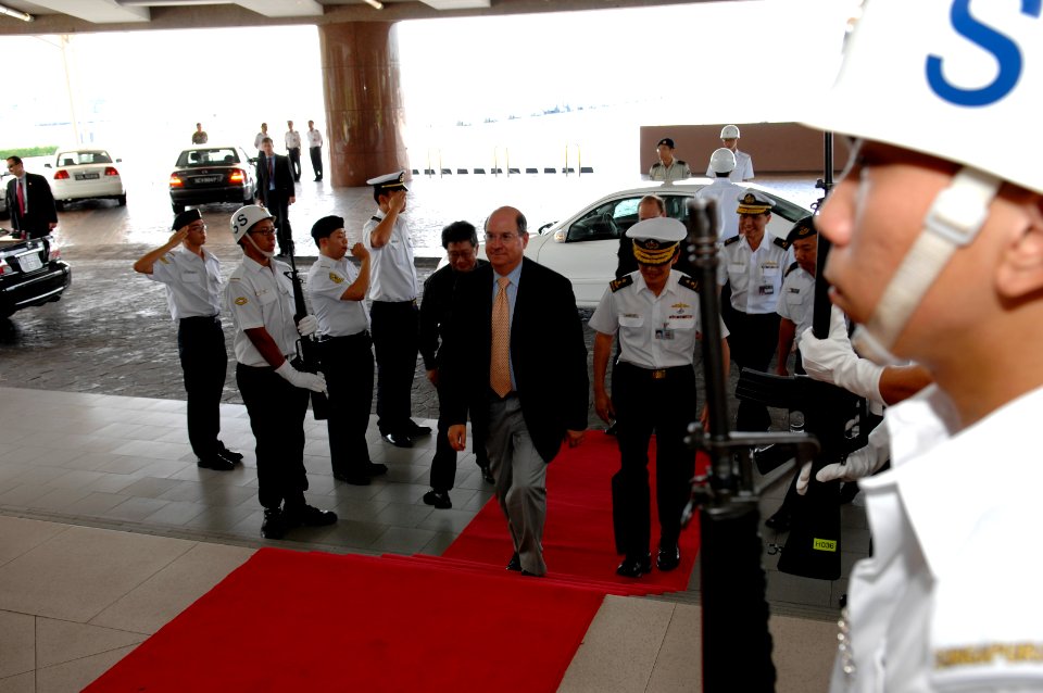 US Navy 070821-N-3642E-123 Secretary of the Navy (SECNAV) the Honorable Dr. Donald C. Winter is saluted as he arrives at Changi Naval Base. SECNAV is visiting the area to get a first-hand look at the way Singapore handles marit