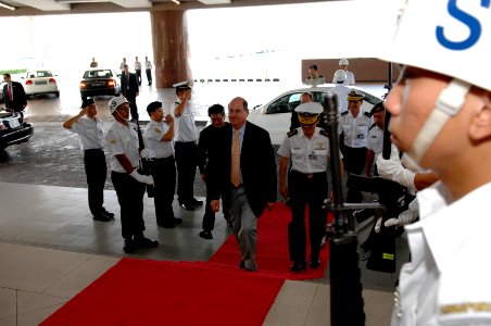 US Navy 070821-N-3642E-123 Secretary of the Navy (SECNAV) the Honorable Dr. Donald C. Winter is saluted as he arrives at Changi Naval Base. SECNAV is visiting the area to get a first-hand look at the way Singapore handles marit