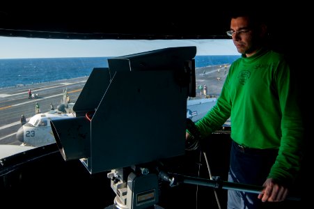 USS Carl Vinson Sailor monitors flight operations 141022-N-TP834-137