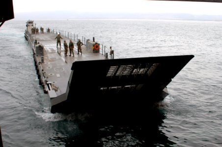 US Navy 070823-N-8335D-121 Sailors aboard amphibious assault ship USS Tarawa (LHA 1) participate in a well deck operation with the Improved Navy Lighterage System (INLS)