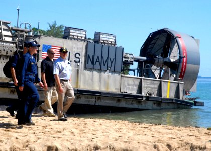 US Navy 070822-N-4267W-111 Secretary of the Navy (SECNAV) the Honorable Dr. Donald C. Winter disembarks Landing Craft Air Cushion (LCAC) 14, assigned to the