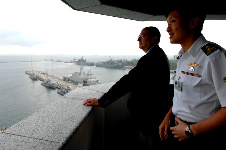 US Navy 070821-N-3642E-163 Singapore's Chief of the Navy Rear Adm. Ronnie Tay briefs Secretary of the Navy (SECNAV) the Honorable Dr. Donald C. Winter on port facilities at Changi Naval Base