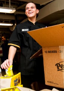 USS Carl Vinson Sailors receive candy 141030-N-WD464-041