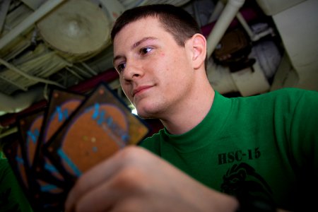 USS Carl Vinson Sailors play Magic, The Gathering 141030-N-NY430-014
