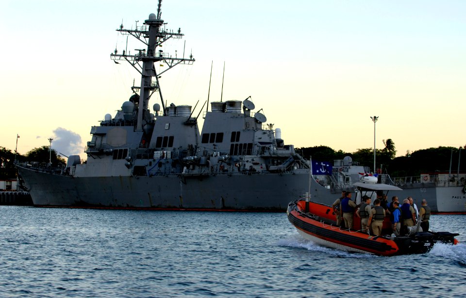 US Navy 070823-N-3642E-949 Secretary of the Navy (SECNAV) the Honorable Dr. Donald C. Winter is transferred to the Naval Special Warfare Compound on a rigid-hulled inflatable boat