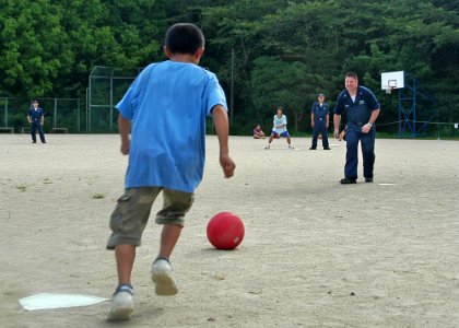 US Navy 070822-N-0807W-233 USS Juneau (LPD 10) Sailors play kickball with the children of the Tenshin-ryo Children's Home after a community relations project (COMREL)