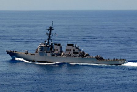US Navy 070823-N-7883G-006 USS Curtis Wilbur (DDG 54) transits behind USS Kitty Hawk (CV 63) during an air power demonstration in the Pacific