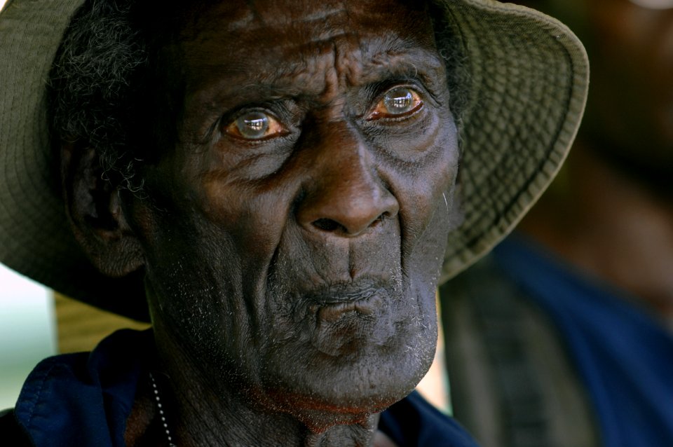 US Navy 070822-N-3642E-296 Eroni Aaron Kumana, waits to meet Secretary of the Navy (SECNAV) the Honorable Dr. Donald C. Winter at the Gizo soccer field