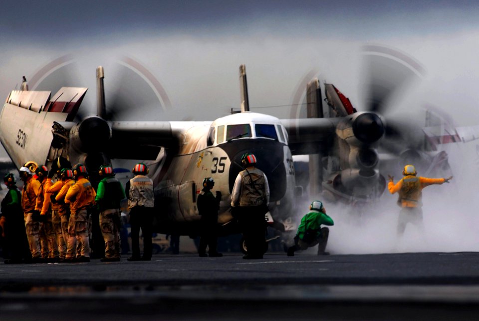 US Navy 070826-N-2659P-065 Flight deck personnel prepare to launch a C-2A Greyhound from the flight deck of Nimitz-class aircraft carrier USS John C. Stennis (CVN 74) for the final time this deployment as the embarked Carrier A