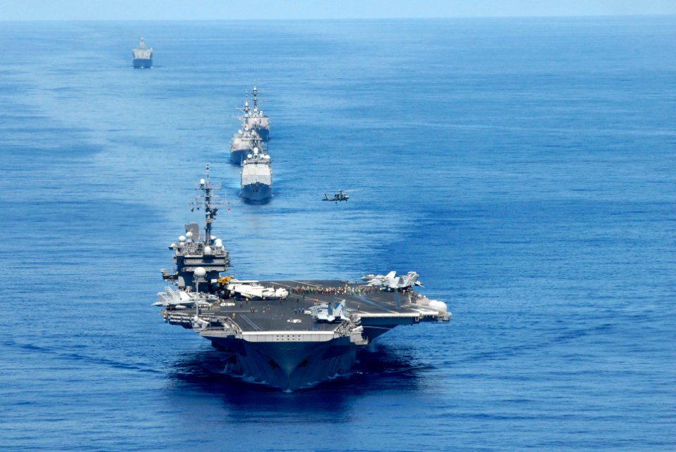 US Navy 070823-N-7883G-028 USS Kitty Hawk (CV 63), USS Cowpens (CG 63), USS Mustin (DDG 89), USS Curtis Wilbur (DDG 54), and USNS Pecos (T-AO 197) transit the Pacific while preparing for an air power demonstration