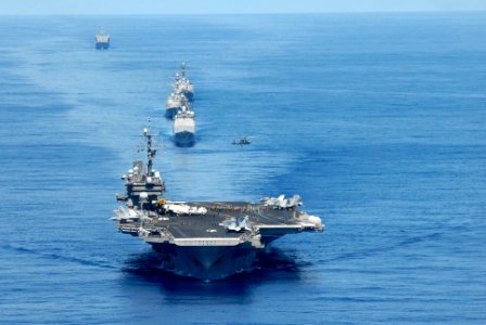 US Navy 070823-N-7883G-028 USS Kitty Hawk (CV 63), USS Cowpens (CG 63), USS Mustin (DDG 89), USS Curtis Wilbur (DDG 54), and USNS Pecos (T-AO 197) transit the Pacific while preparing for an air power demonstration
