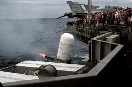 US Navy 070824-N-3038W-343 Friends and family of Sailors aboard Nimitz-class aircraft carrier USS John C. Stennis (CVN 74) watch a demonstration of the ship's close-in weapon system as part of an air power demonstration