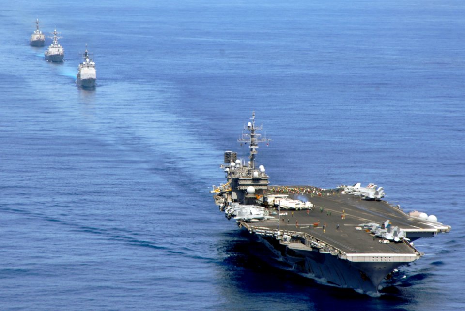US Navy 070823-N-6106R-244 USS Kitty Hawk (CV 63), USS Cowpens (CG 63), USS Mustin (DDG 89), and USS Curtis Wilbur (DDG 54) transit the Pacific while preparing for an air power demonstration