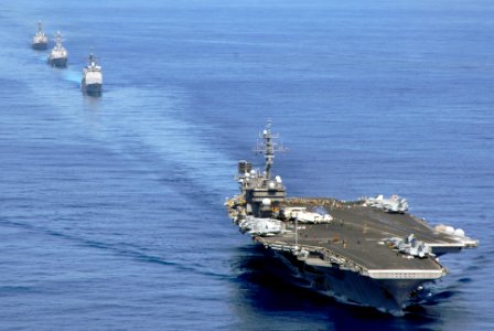 US Navy 070823-N-6106R-244 USS Kitty Hawk (CV 63), USS Cowpens (CG 63), USS Mustin (DDG 89), and USS Curtis Wilbur (DDG 54) transit the Pacific while preparing for an air power demonstration