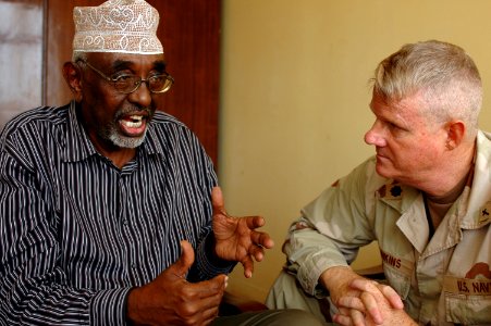 US Navy 070827-A-4381M-001 Cmdr. Walter Dinkins, Combined Joint Task Force-Horn of Africa (CJTF-HOA) command chaplain, meets with the Minister of Islamic Affairs and Wafti of Djibouti, Mogeuh Dirir Samatar photo
