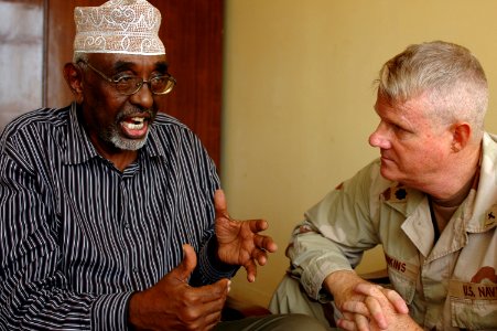 US Navy 070827-A-4381M-001 Cmdr. Walter Dinkins, Combined Joint Task Force-Horn of Africa (CJTF-HOA) command chaplain, meets with the Minister of Islamic Affairs and Wafti of Djibouti, Mogeuh Dirir Samatar