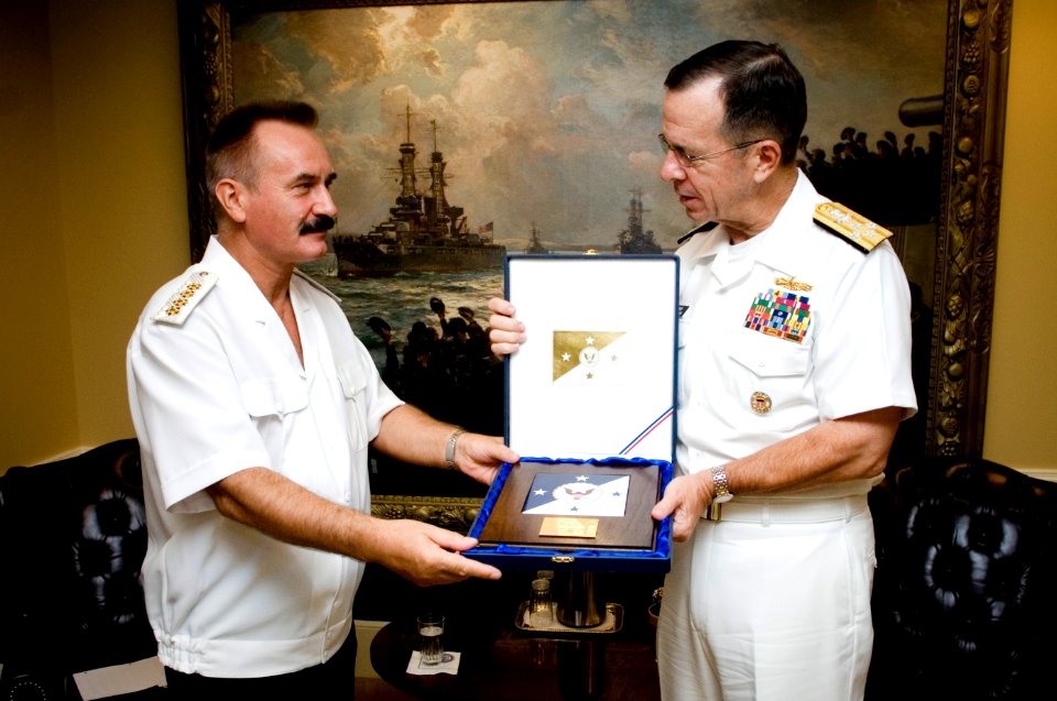 US Navy 070824-N-0696M-176 Chief of Naval Operations Adm. Mike Mullen presents Adm. Vladimir Masorin, commander in chief of the Russian Navy, with a commemorative plaque at the conclusion of an office call at the Pentagon