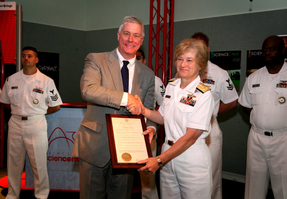 US Navy 070828-N-3271W-005 Vice Adm. Ann E. Rondeau, deputy commander, United States Transportation Command accepts a St. Louis Navy Week declaration plaque from Missouri Lieutenant Governor Peter Kinder