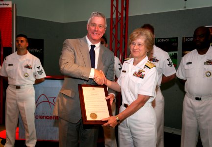 US Navy 070828-N-3271W-005 Vice Adm. Ann E. Rondeau, deputy commander, United States Transportation Command accepts a St. Louis Navy Week declaration plaque from Missouri Lieutenant Governor Peter Kinder