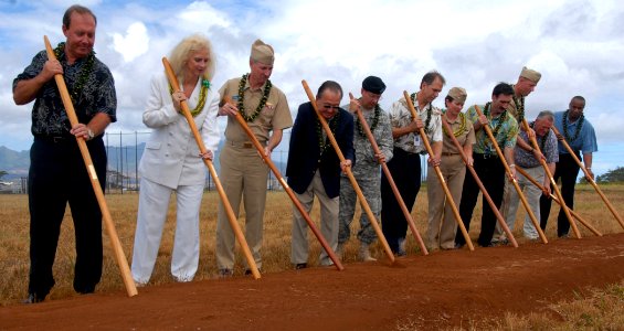 US Navy 070830-N-9758L-135 Cary Sparks and Henry Lee are among those breaking ground during a ceremony for the new Hawaii Regional Security Operations Center complex at the U.S. Naval Computer and Telecommunications Area Master