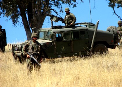 US Navy 070827-N-8547M-069 Members of Naval Mobile Construction Battalion (NMCB) 5 take up a position in a security alert drill during Operation Bearing Duel 6-07
