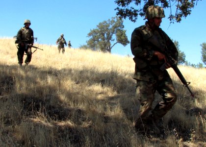 US Navy 070827-N-8547M-047 Members of Naval Mobile Construction Battalion (NMCB) 5 execute a security alert drill during Operation Bearing Duel 6-07